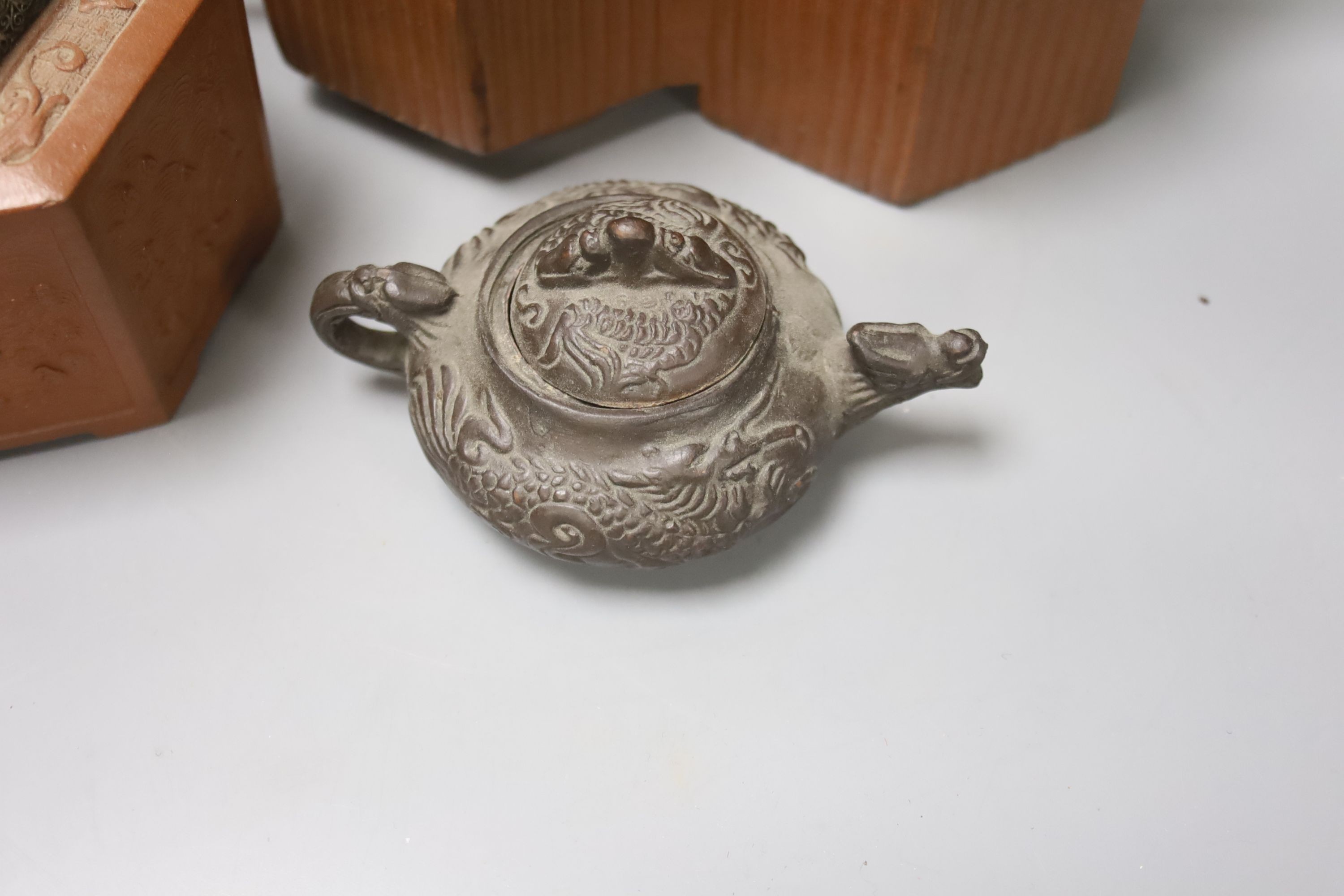 Two 19th century Chinese Yixing teapots (no covers) and a later Yixing miniature teapot